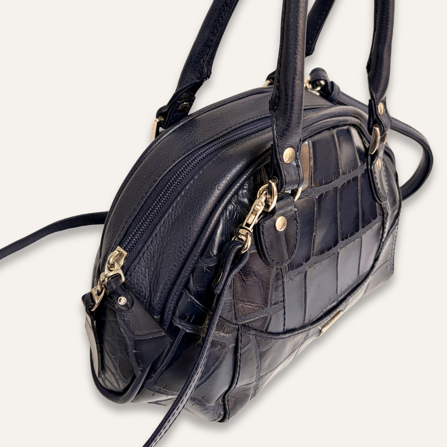 Cartera pequeña redonda azul oscura