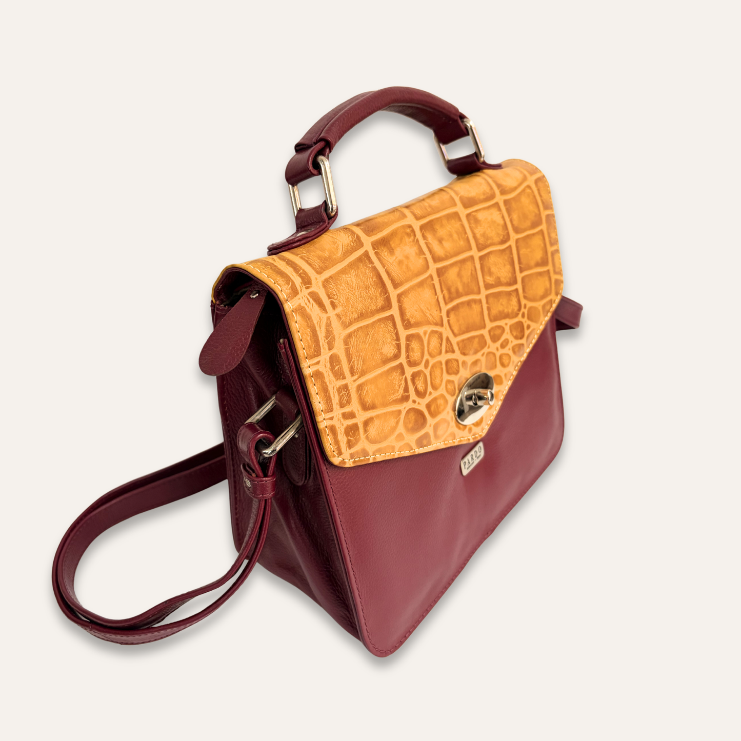 Cartera de tapa vinotinto