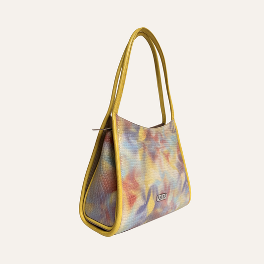 Bolso concavo lila marmolado