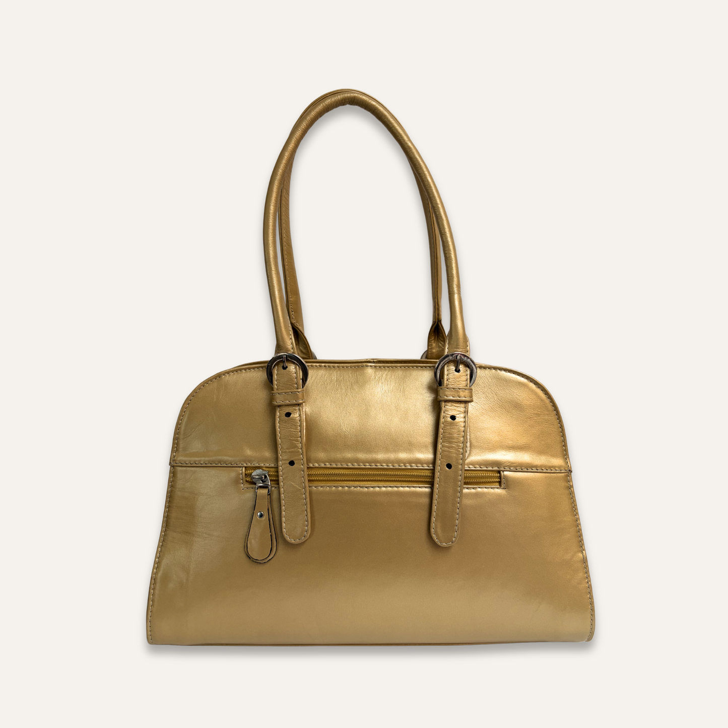 Cartera en charol dorada