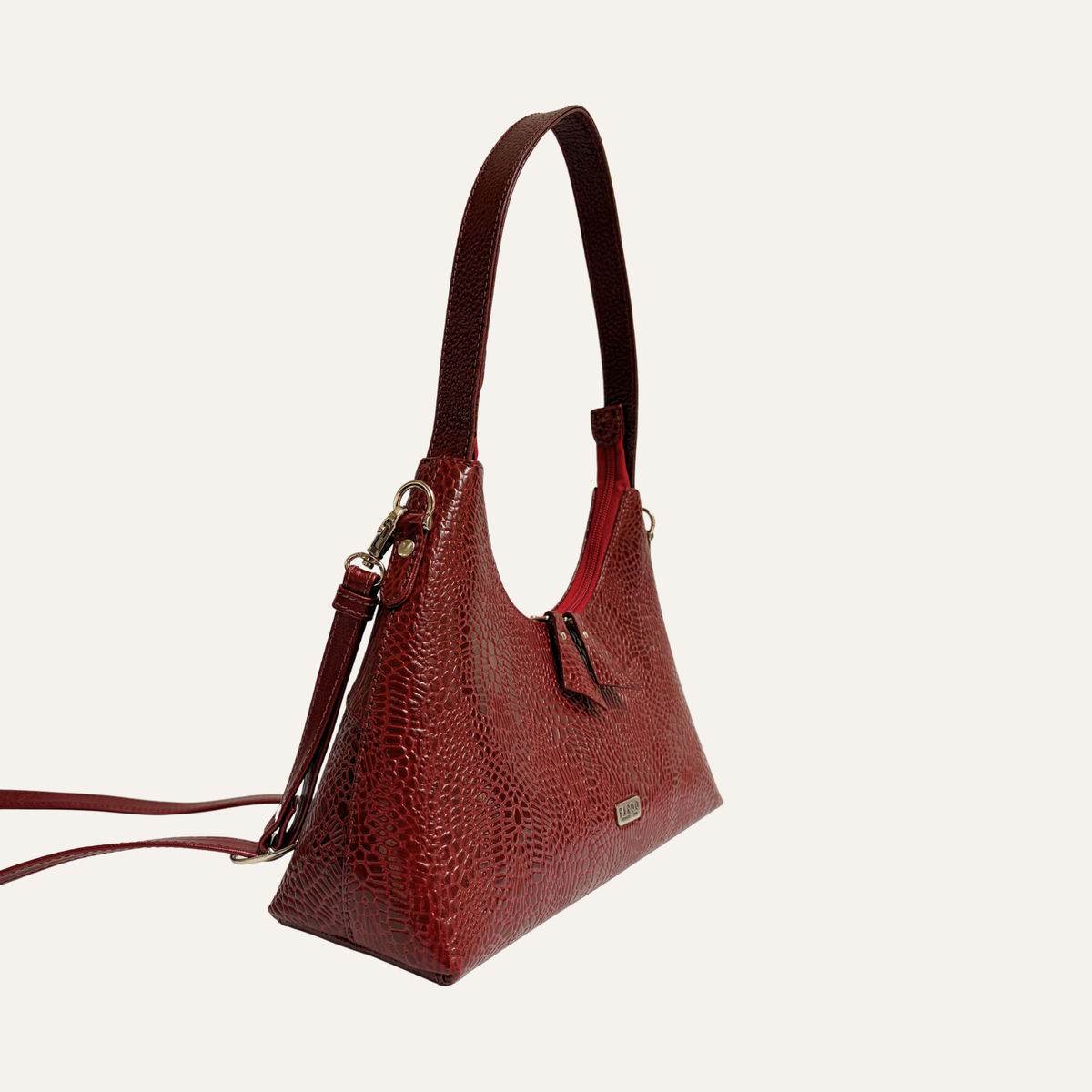 Cartera serena en cuero vinotinto carey
