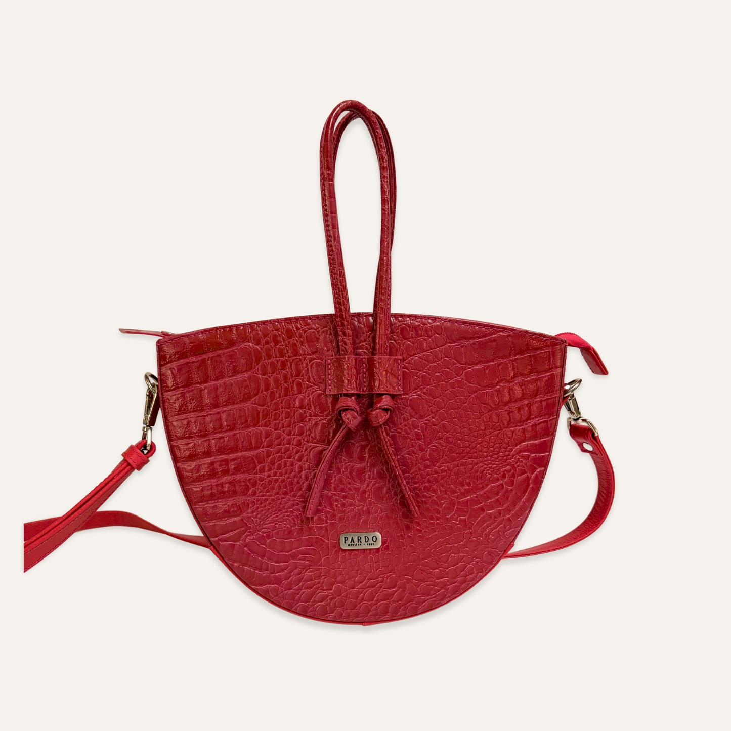 Cartera mediana de cordones fucsia