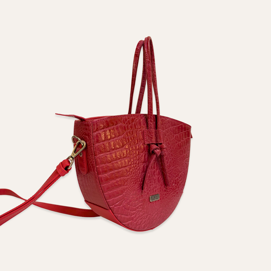 Cartera mediana de cordones fucsia