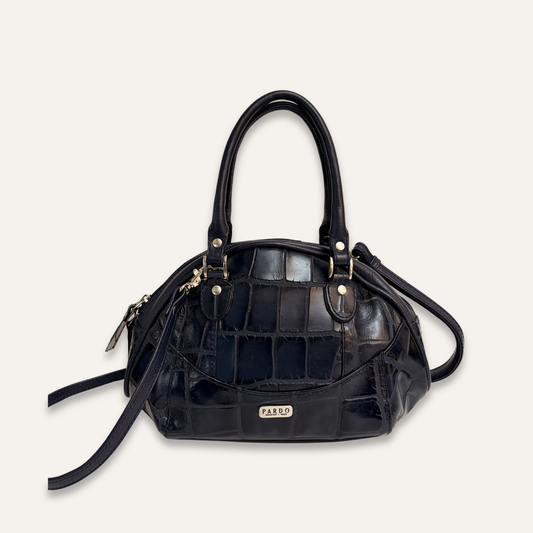 Cartera pequeña redonda azul oscura