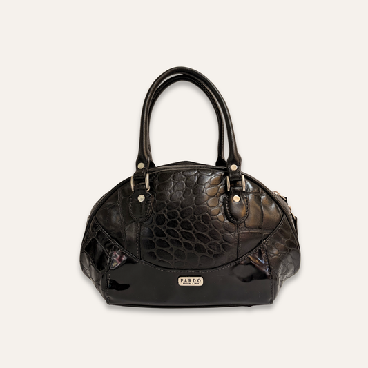 Cartera pequeña redonda negra