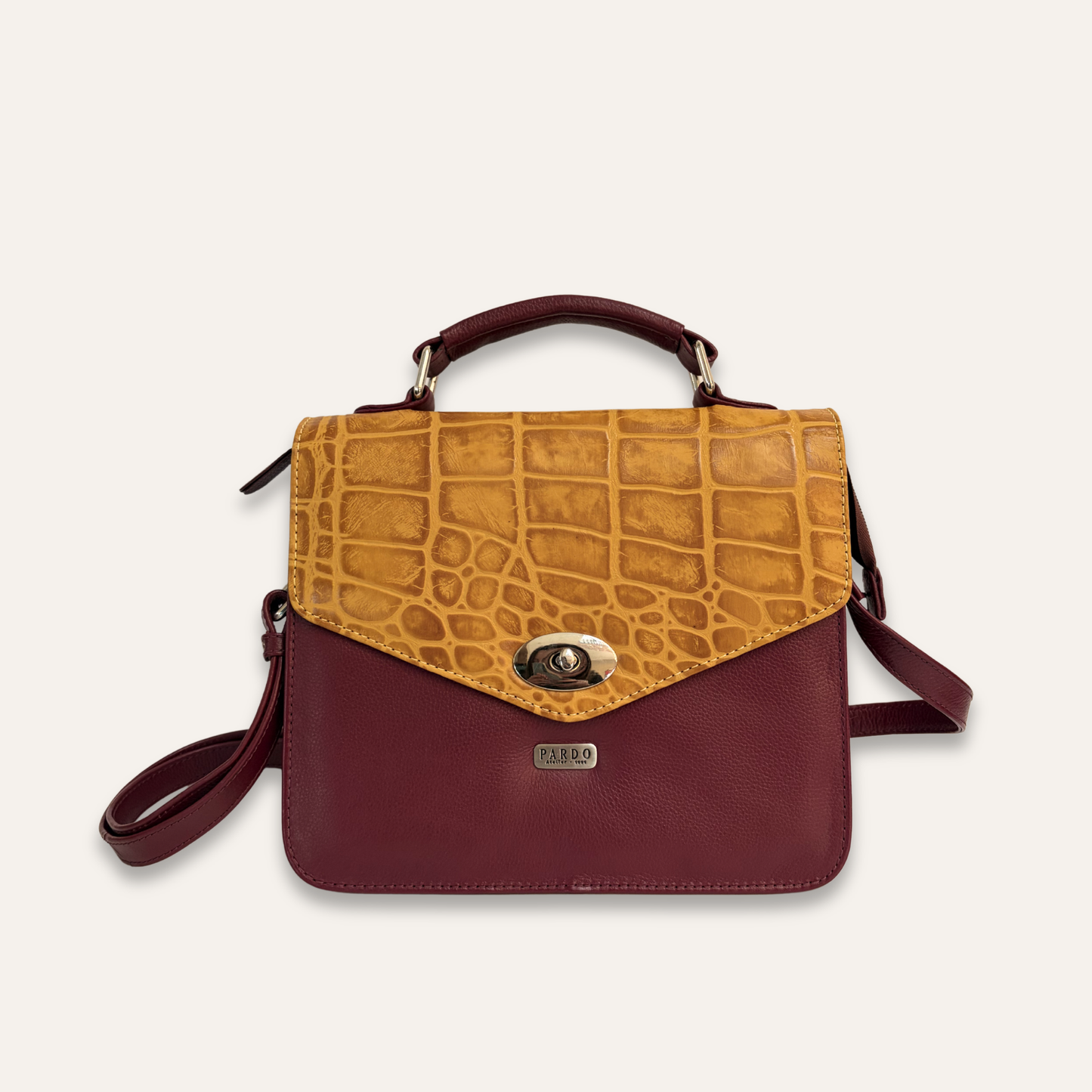 Cartera de tapa vinotinto