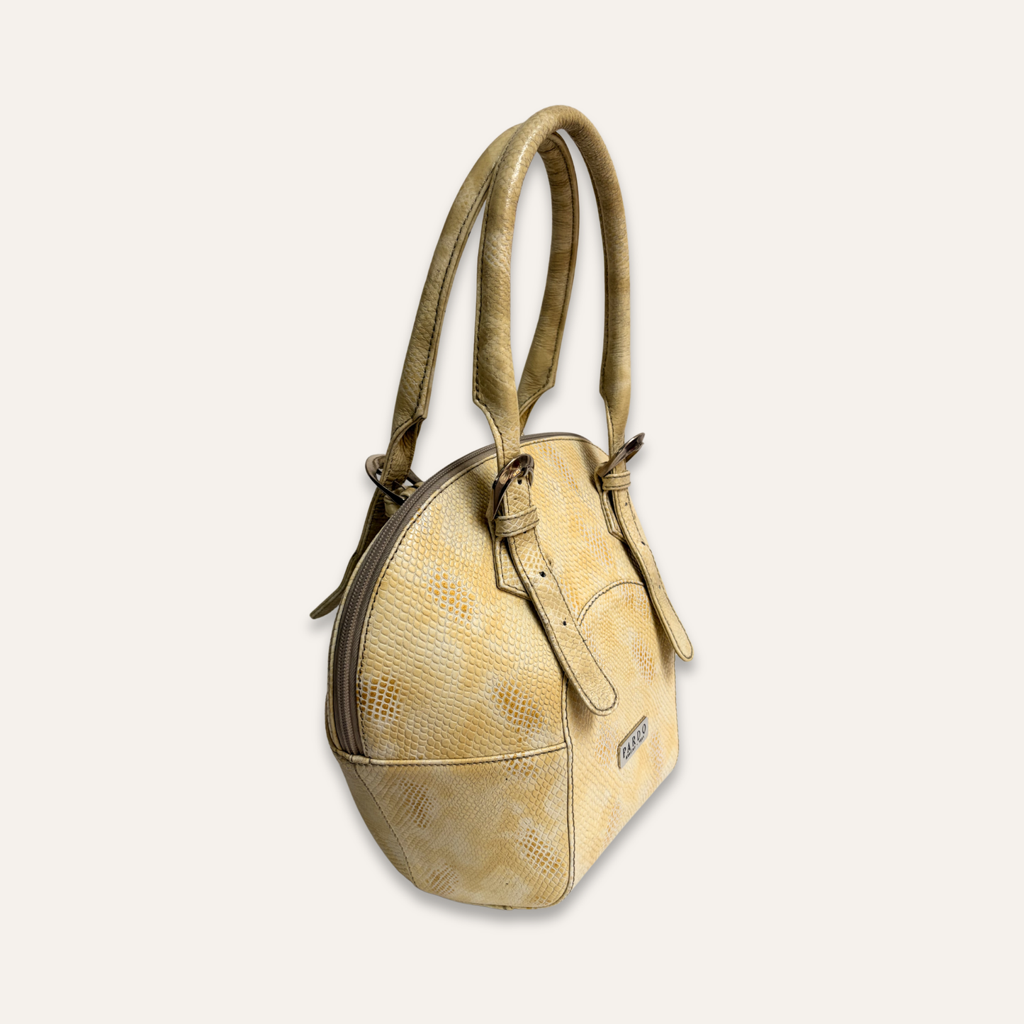 Bolso redondo beige