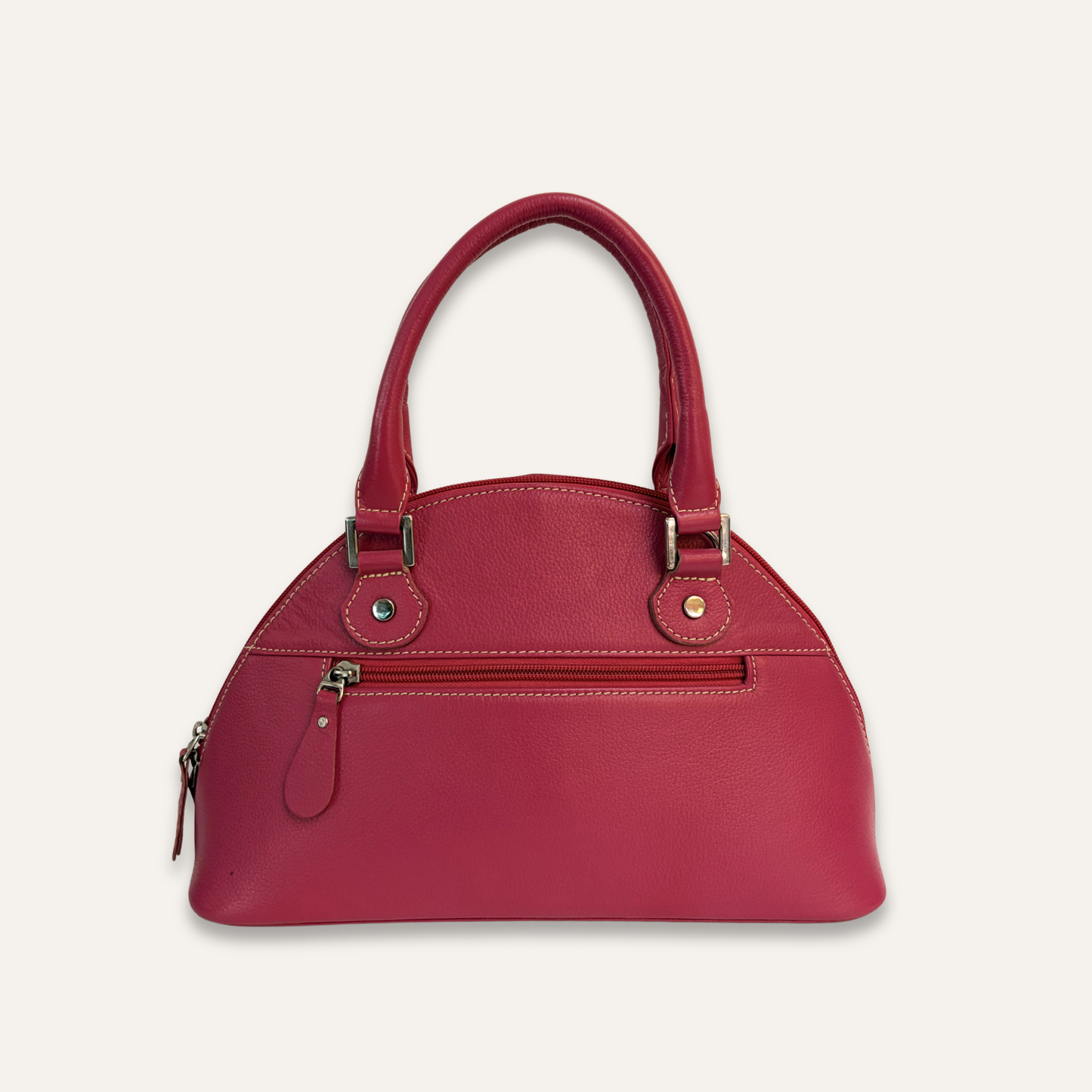 Cartera media luna fucsia