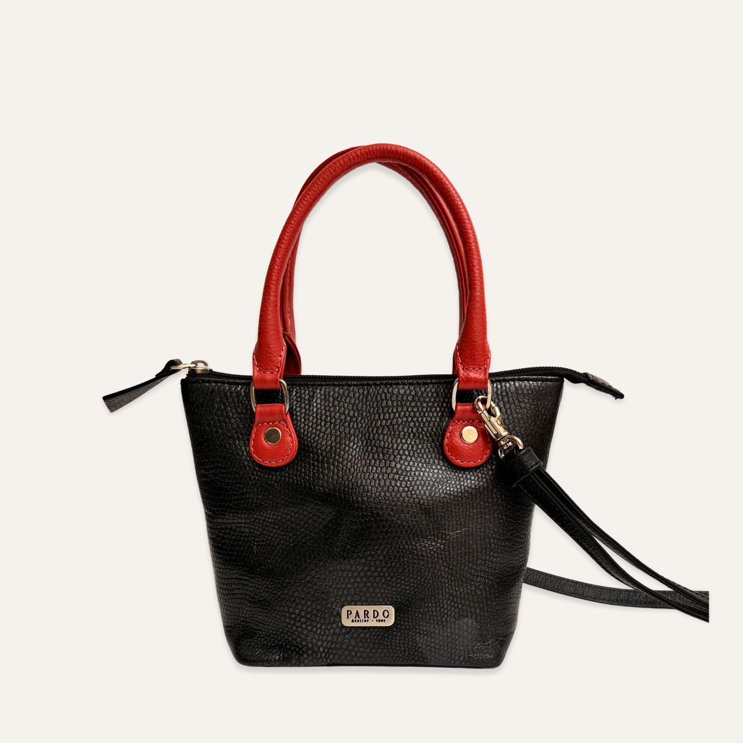 Bolso mini cubo negro marmolado
