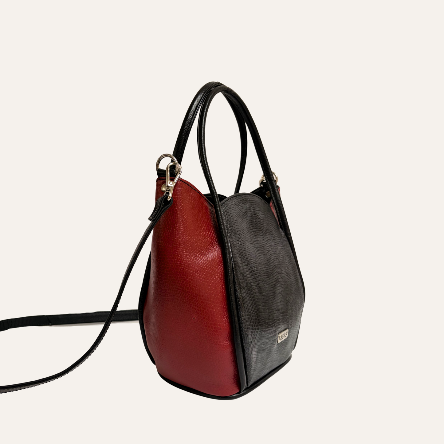 Cartera petalos negra combinada