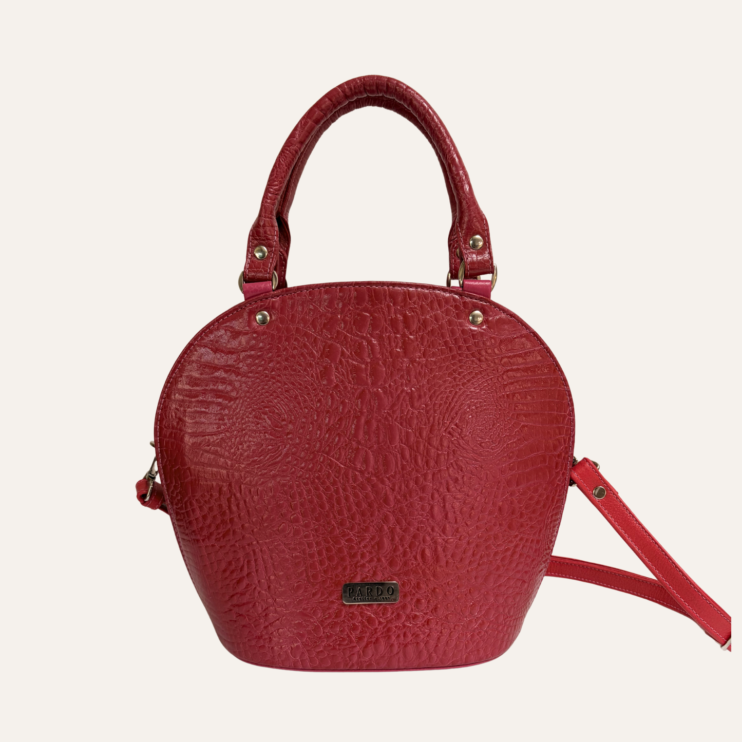 Cartera arco fucsia