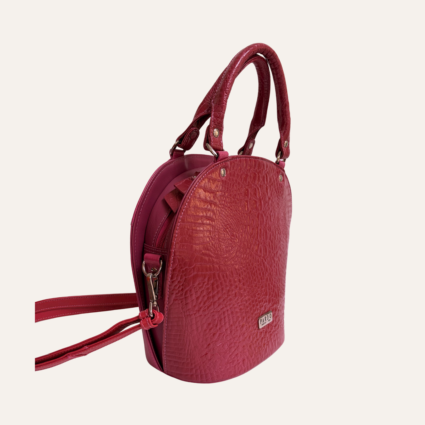 Cartera arco fucsia